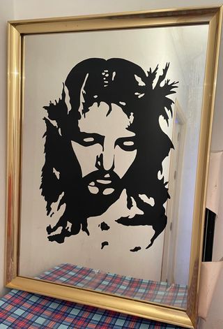 Espejo grabado con imagen de Jesucristo