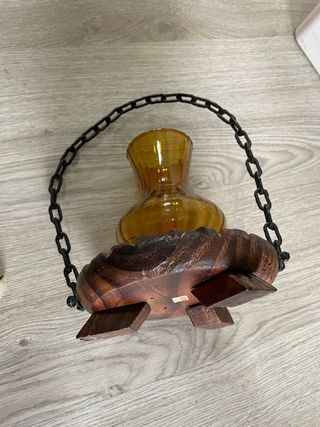 Candelabro de madera tallada y forja.