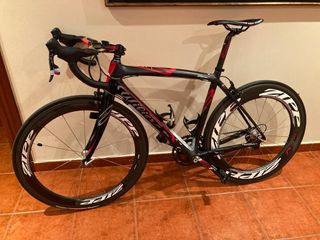 bicicleta gimnasio pesas