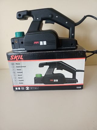 Cepillo lijador SKIL 1506 con instrucciones.