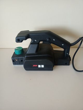 Cepillo lijador SKIL 1506 con instrucciones.