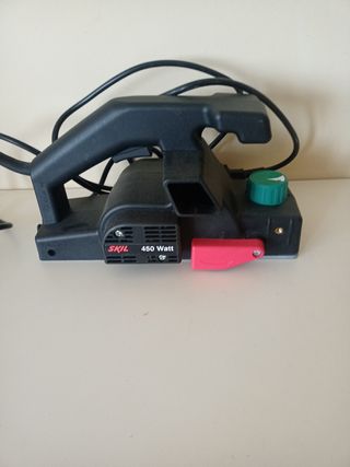 Cepillo lijador SKIL 1506 con instrucciones.