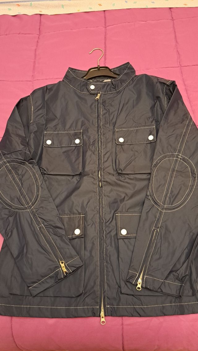 Chaqueta cortavientos azul