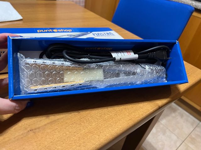 Piastra stira capelli agli ioni