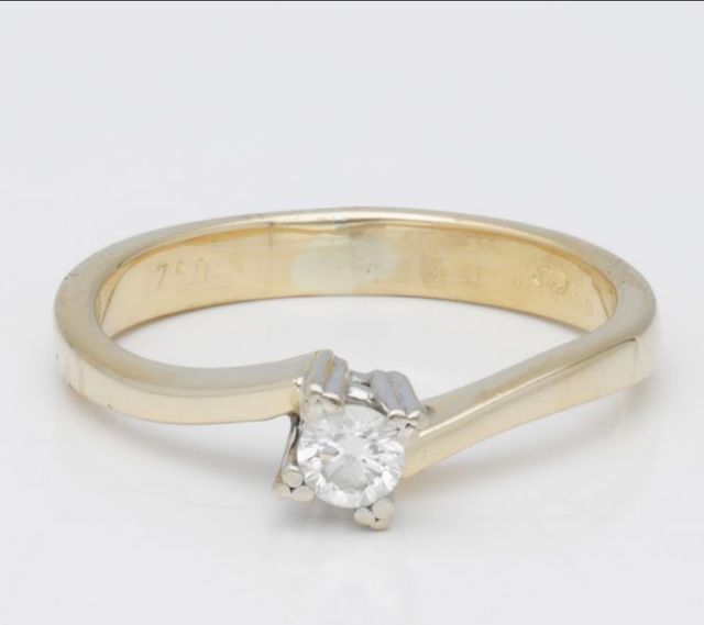 anello con diamante 0,11 kt in oro bicolore