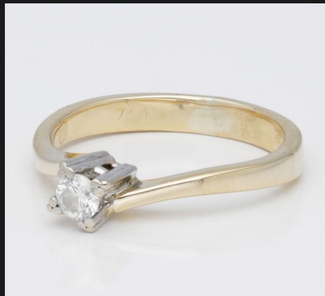 anello con diamante 0,11 kt in oro bicolore