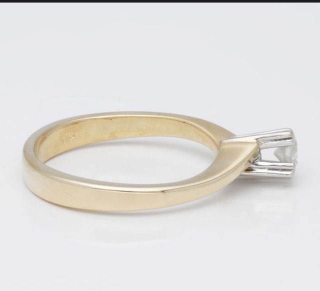 anello con diamante 0,11 kt in oro bicolore