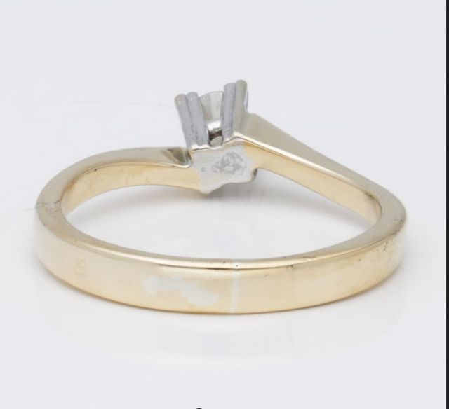 anello con diamante 0,11 kt in oro bicolore