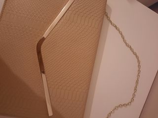 cartera de mano  y colga