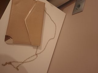 cartera de mano  y colga