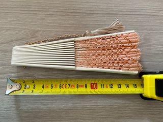 Abanico de encaje de bolillos hecho a mano