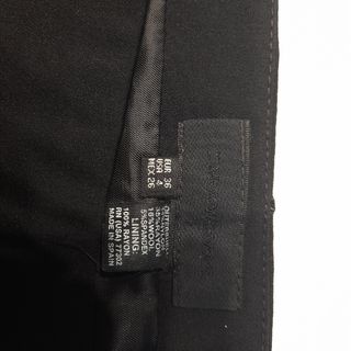 Falda negra elástica midi de Zara talla 36