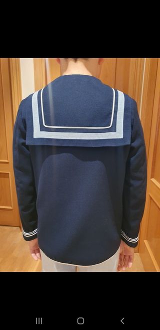 Traje de comunión de niño y zapatos .
