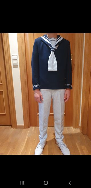 Traje de comunión de niño y zapatos .