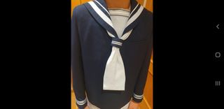 Traje de comunión de niño y zapatos .