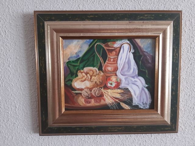 Cuadros decorativos con tejido y marco dorado