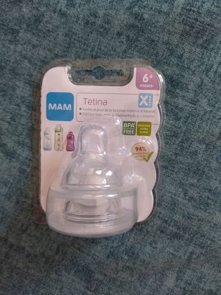 bebé chupete biberón peluche zapatillas