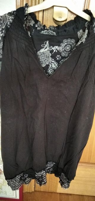 Blusa de desigual negra y blanca