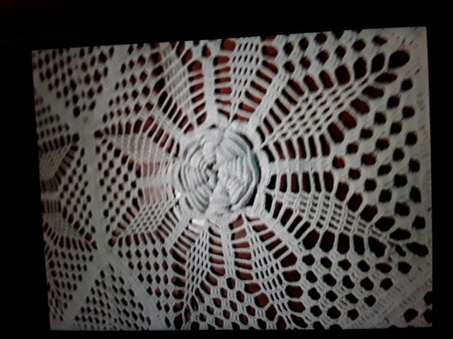 Tapete antiguo de ganchillo forma estrellas y flec