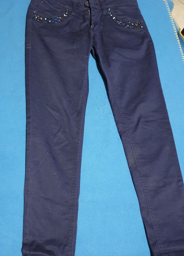 pantaloni donna con pietre colorate bordo tasche