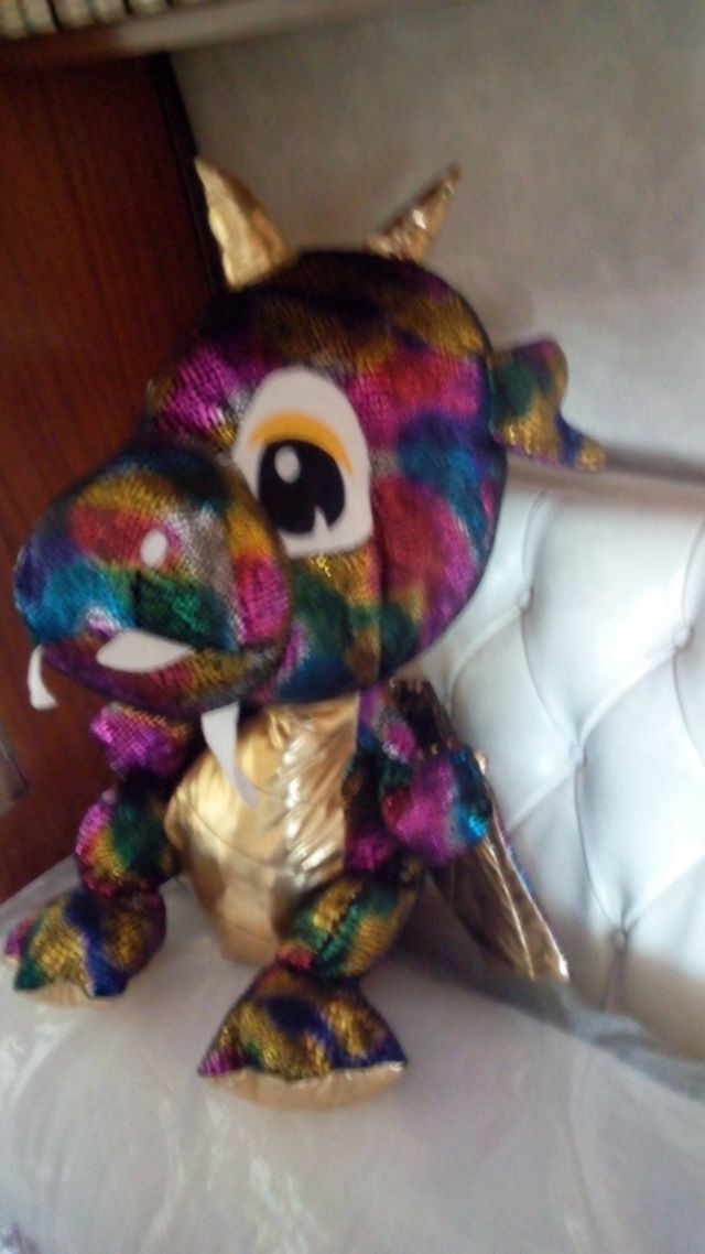muñeco peluche dragón iridiscente