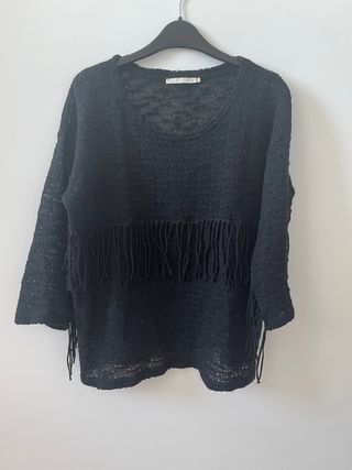 Jersey negro con flecos