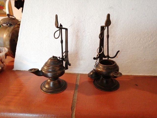 lumi ad olio in bronzo