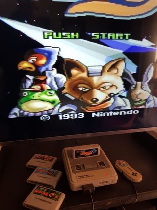 Súper Famicom con 4 juegos 1 mando y cables.