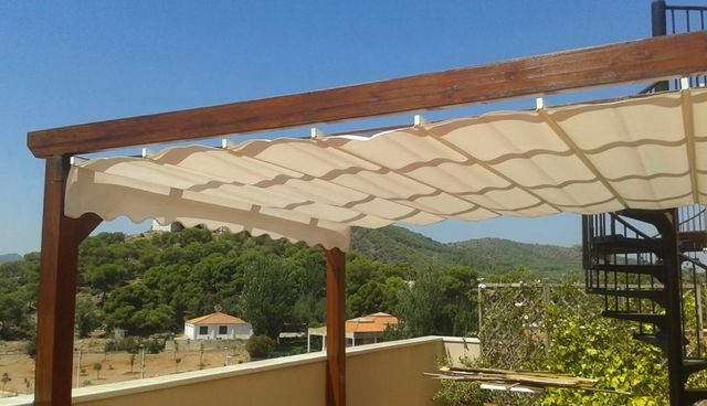 Pérgola con toldo