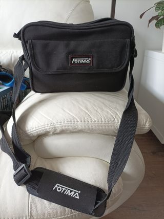 cámara fotográfica Cosina con accesorios