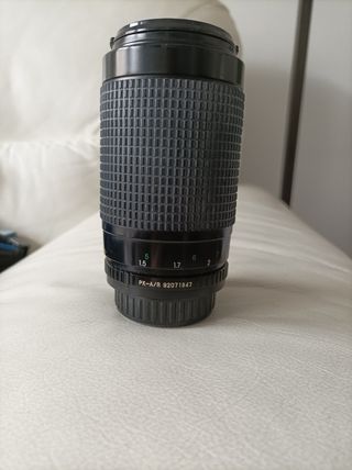 cámara fotográfica Cosina con accesorios