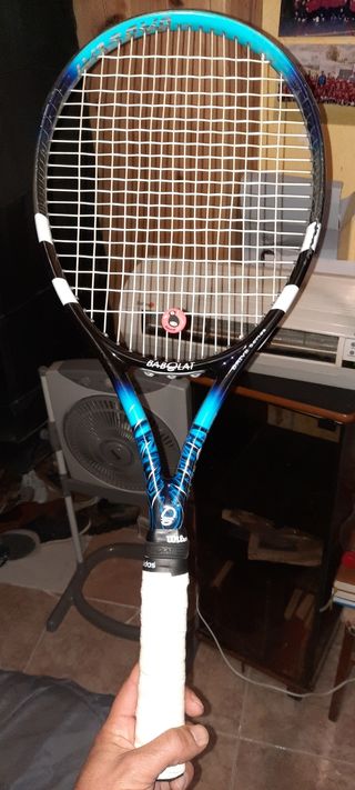 raqueta de tenis casi sin uso