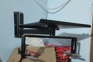 soporte de pared de tv pequeña  y tambien para dvd
