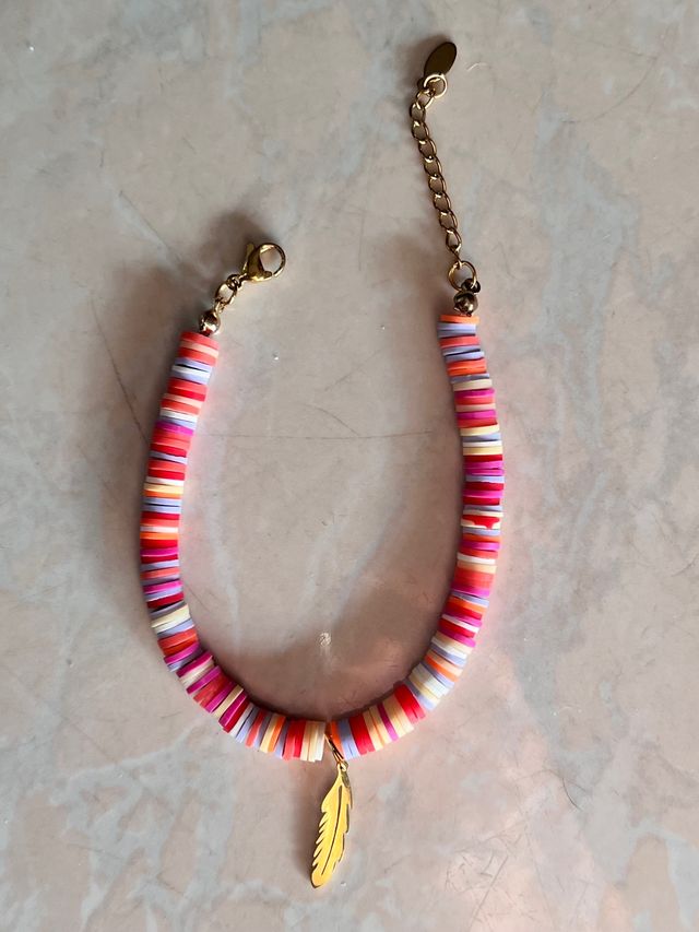 Bracciale con dischi heishi ciondolo Magenta oro
