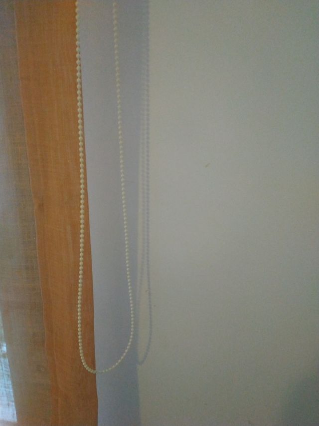 Se vende estor naranja hecho a medida.