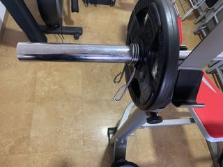 Banco pesas BH con barra olímpica y pesas