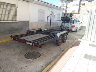 Alquiler remolques plataforma coche 