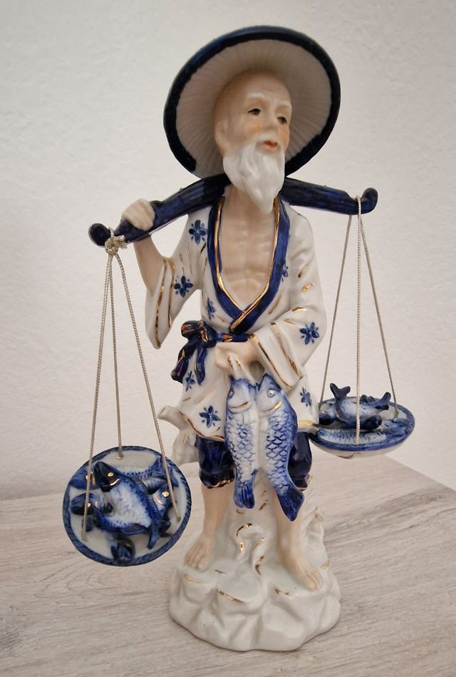 Pescador de porcelana japonesa