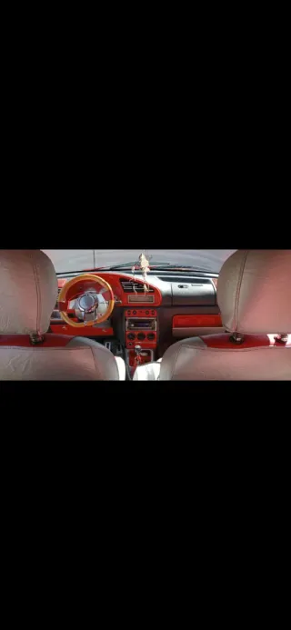 Citroen Berlingo 2002, totalmente tuneada y todo homologado, la más alta de su gama, con dos puertas laterales,no se va sin transferir.