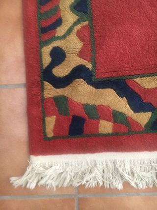 Alfombra granate de lana