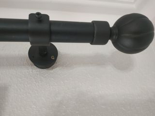 Barra de cortina con terminales redondeados