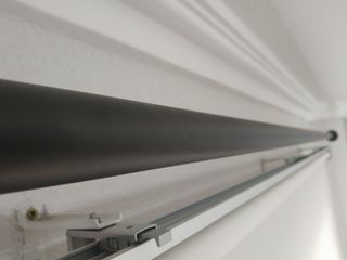 Barra de cortina con terminales redondeados