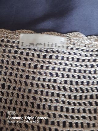 Cardigan in cotone con lavorazione all'uncinetto.