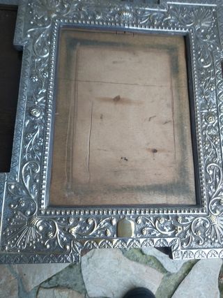 marco plateado.Muy antiguo.Portaretratos.