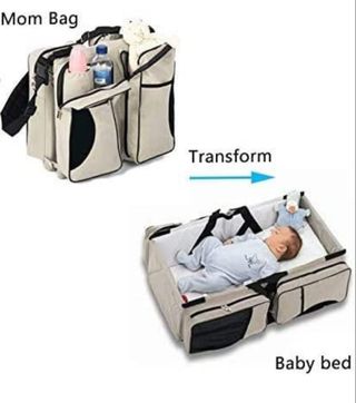 Bolso cambiador y cuna bebé