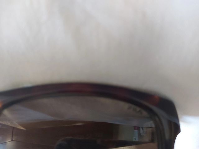 Óculos sol mulher Fila, em massa castanho. Vintage