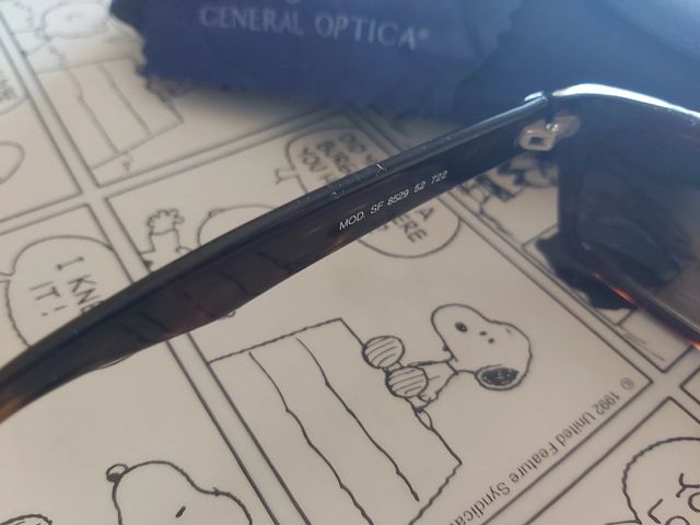 Óculos sol mulher Fila, em massa castanho. Vintage