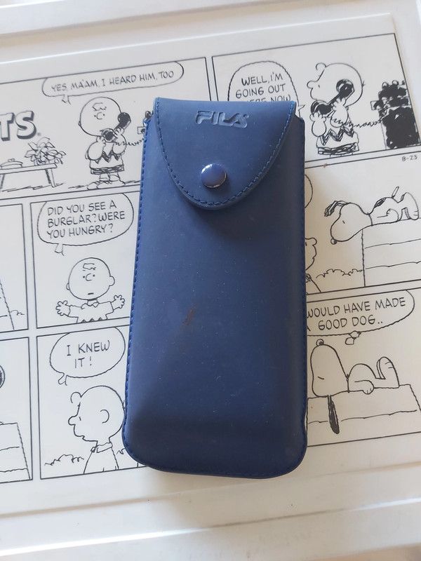 Óculos sol mulher Fila, em massa castanho. Vintage