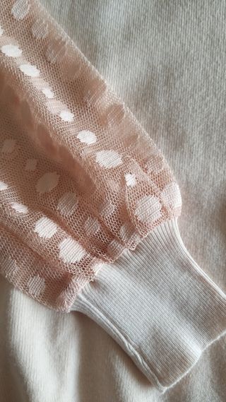 Jersey mangas de encaje.
