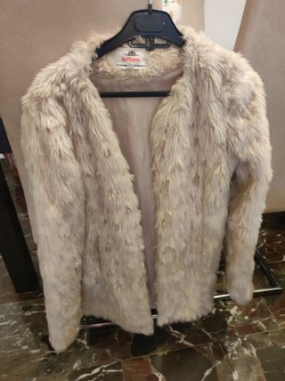 abrigos, diferentes tallas